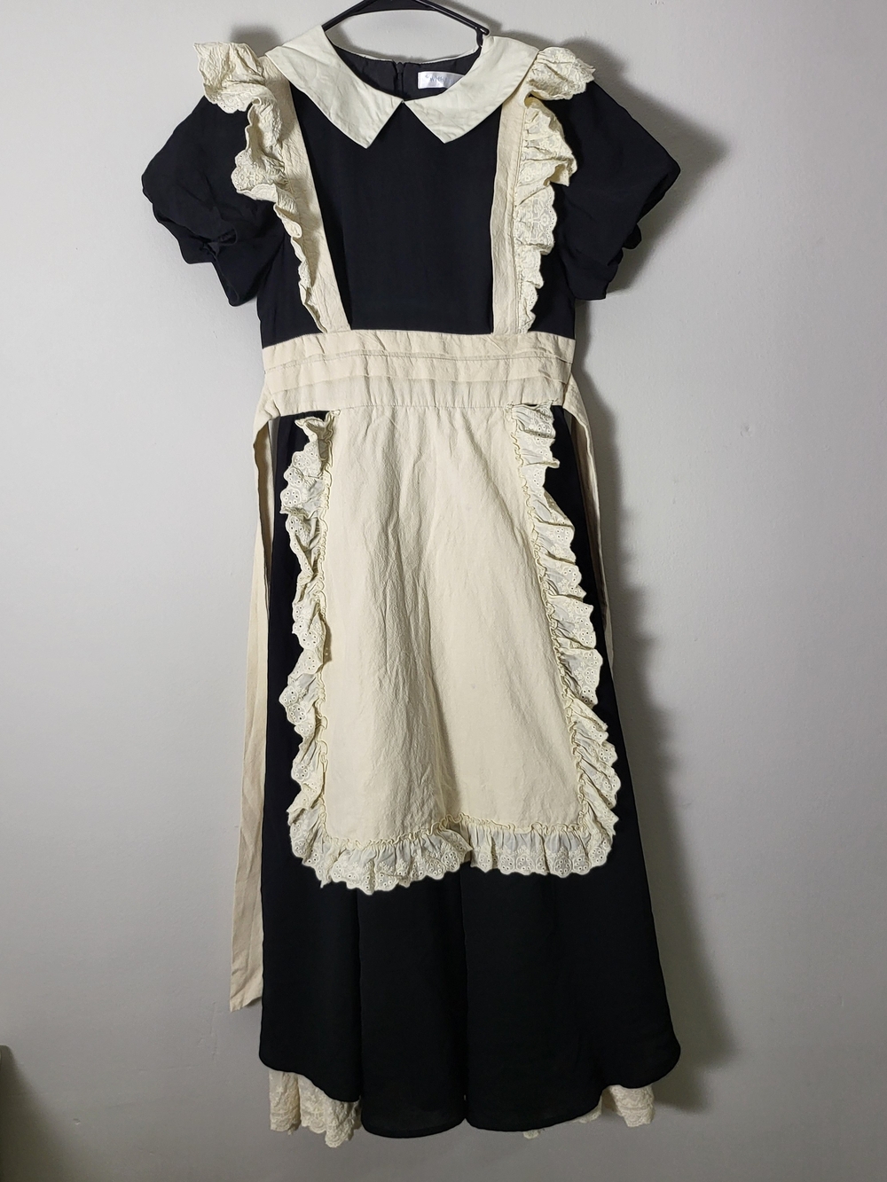 Vintage-Inspired Black Midi Dress with Cream Ruffled Apron